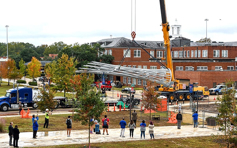 A new addition to the campus landscape, a 45-foot tall sculpture titled Aspire, is bolted in place Thursday, Nov. 11, 2021, The inspiring piece of art is installed in the center of a new grove of noble oak trees planted between Keeny Hall and the College of Business and is designed to honor the spirit of transformation and innovation that is a core part of Louisiana Tech University. Aspire was constructed and is being installed by Portland, Oregon, artist Curtis Pittman as a part of Louisiana’s Percent for Art program. Photographed by Emerald McIntyre/Louisiana Tech University